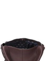 Uploaded brown bag interior detail with patterned lining and top fastening